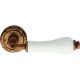 Linea Cali Dalia antique brass round rosette handle set with white porcelain 600 RB 103 PB AN