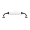 Bútor fogantyú 128 mm-es tengelytávolság antik sárgaréz/porcelán fehér